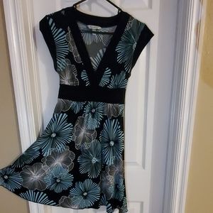 Turquoise, white, and black dress